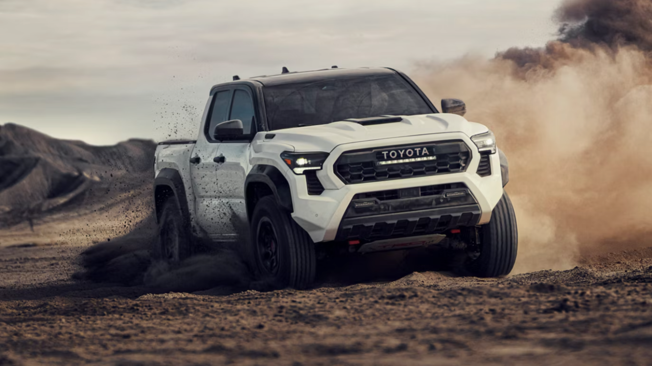 Front view of the 2026 Toyota Tacoma on a dirt road